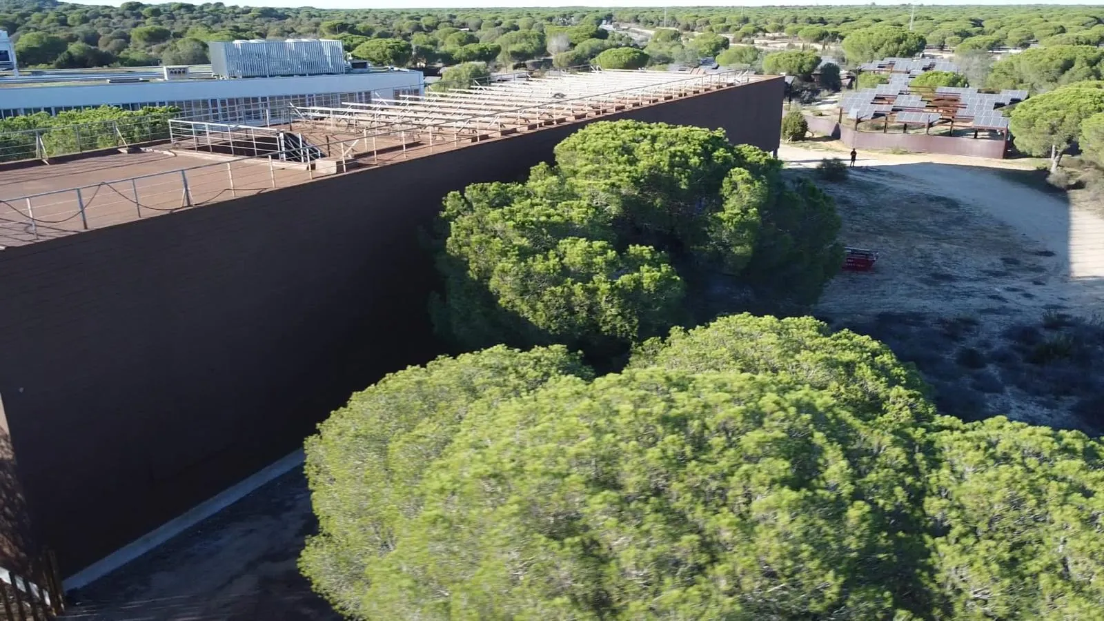 Obra real · Fachada con corcho proyectado